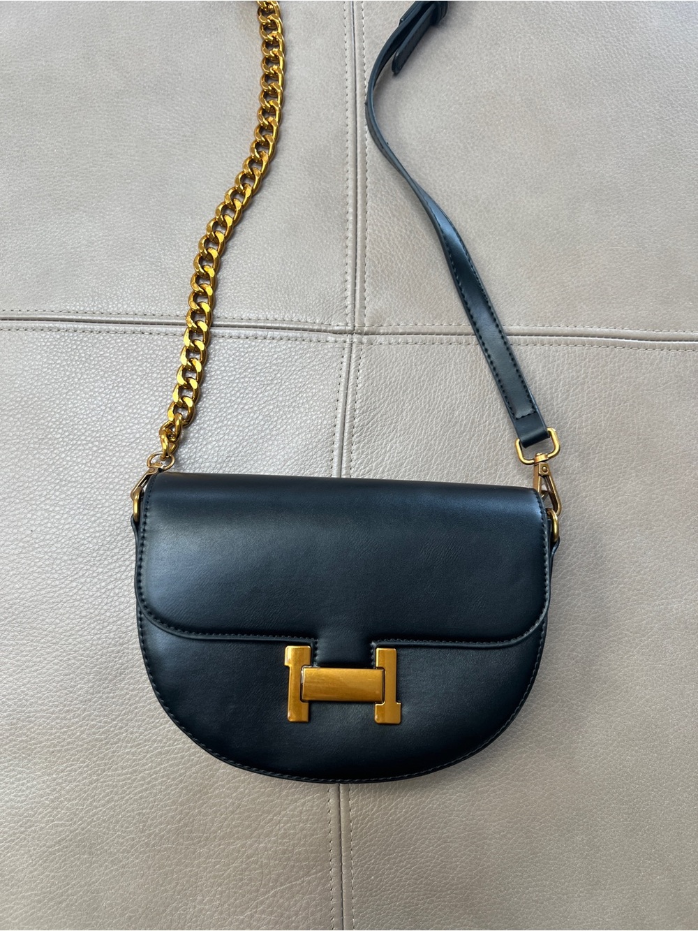 Panova Black Vegan Leather Crossbody Saddle Bag with Gold Hardware